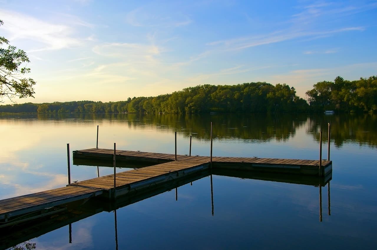 Peaceful dock on Beeds Lake at sunset, Iowa State Park