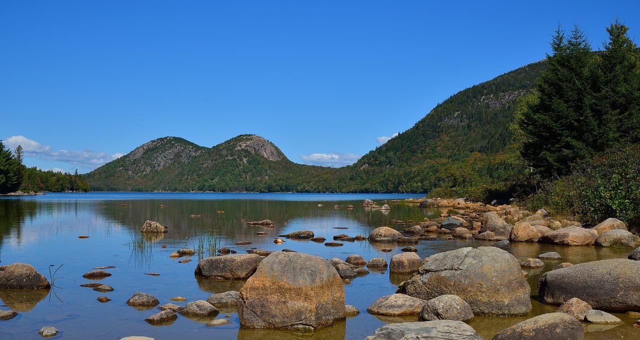 Serene lake surrounded by nature in Acadia, Maine