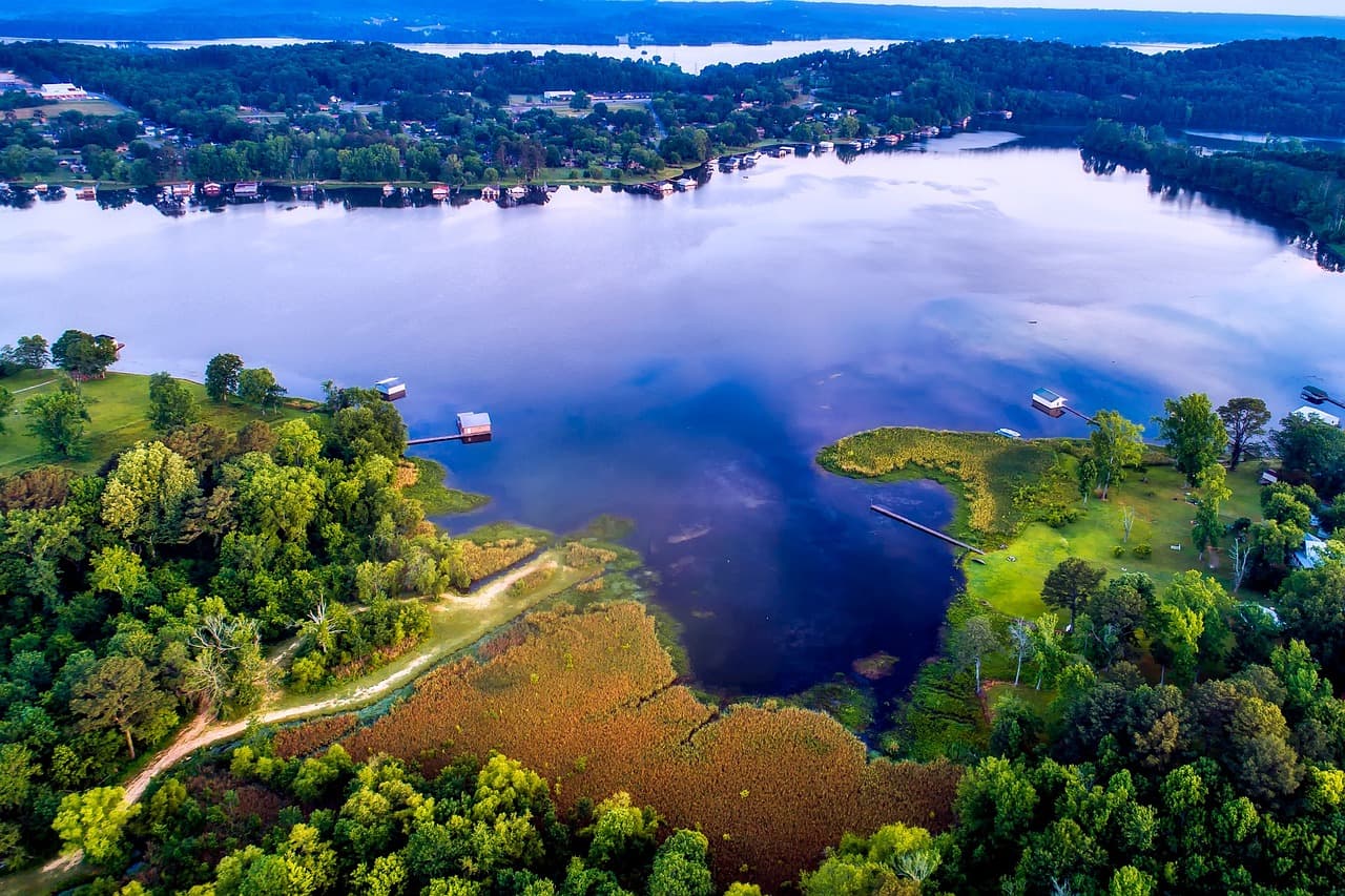 Aerial view of Lake Guntersville in Alabama with forest reflections