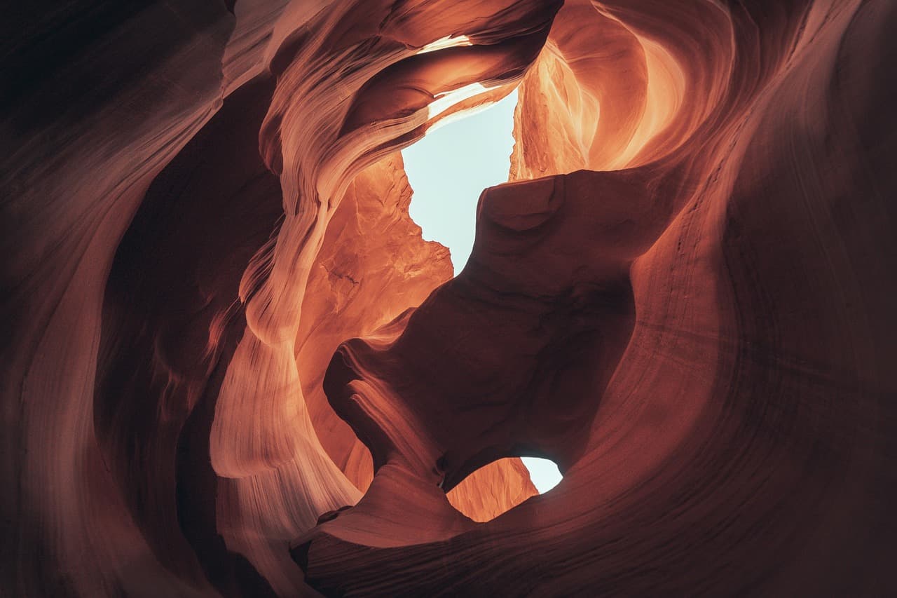 Sculpted sandstone walls of Antelope Canyon in Arizona's desert landscape