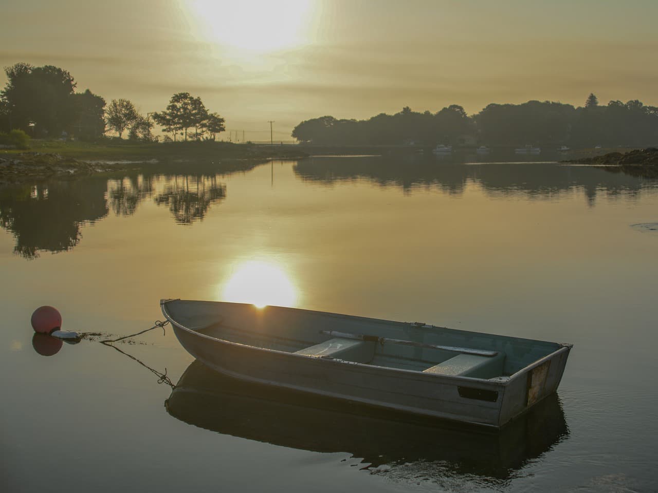 Sunrise over boats in New Castle, New Hampshire