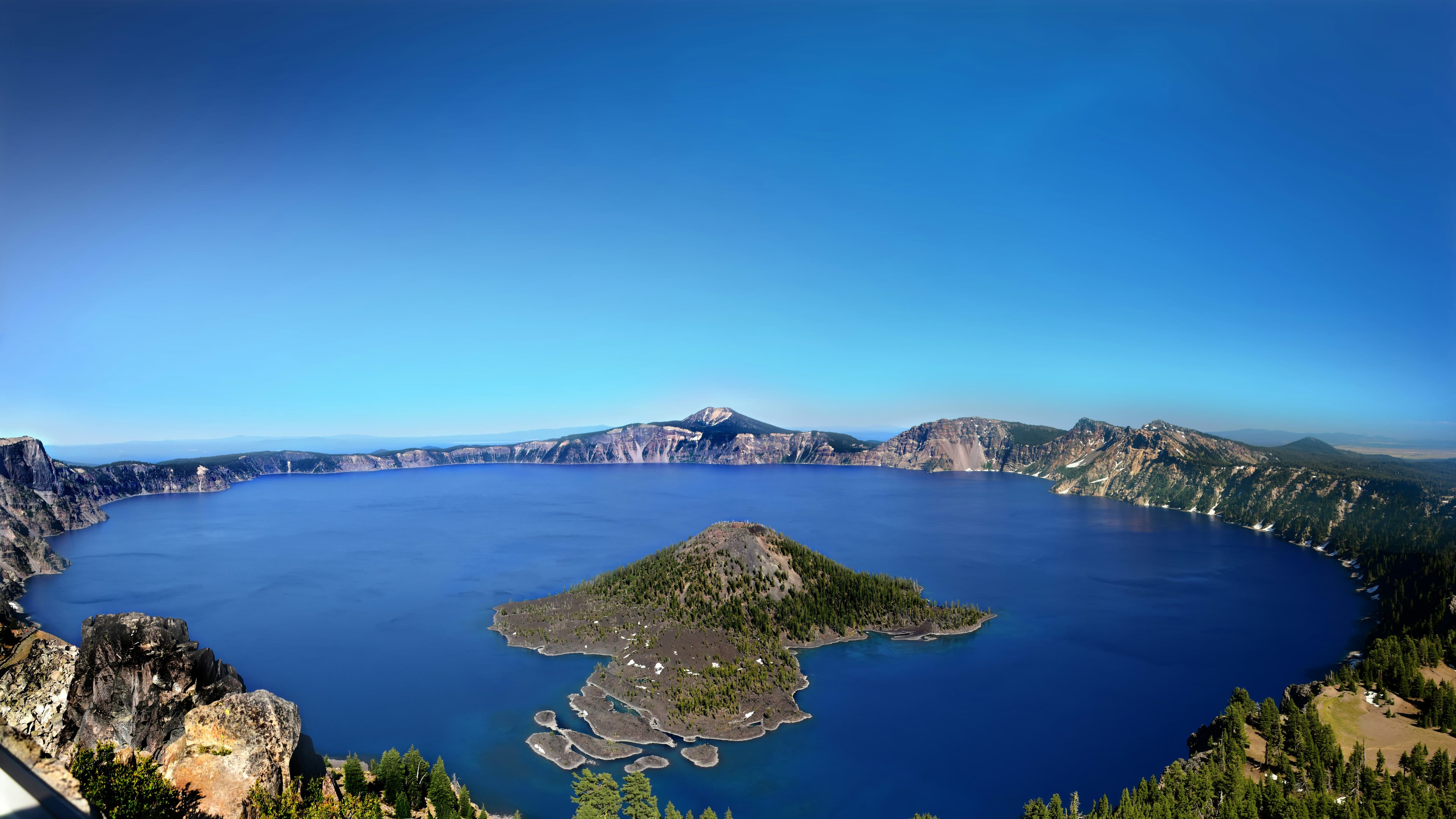Serene Crater Lake surrounded by Oregon's Cascade Range mountains